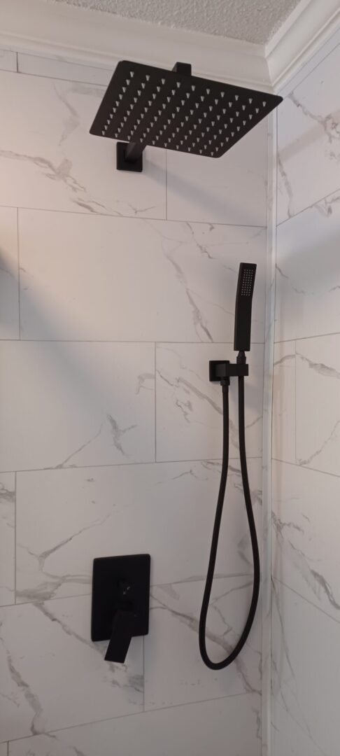 Elegant shower design with handheld attachment